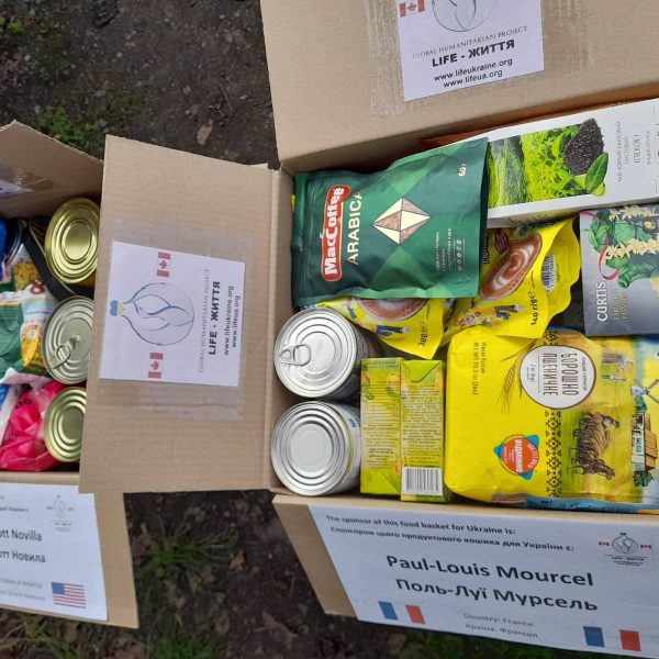 Food baskets sponsored by many countries are being assembled and given to families in need